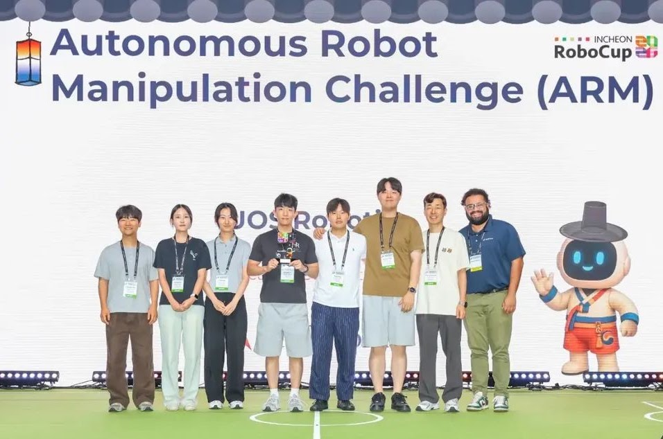 UOS Robotics team members and event representatives at the RoboCup 2026 ARM Challenge awards presentation.